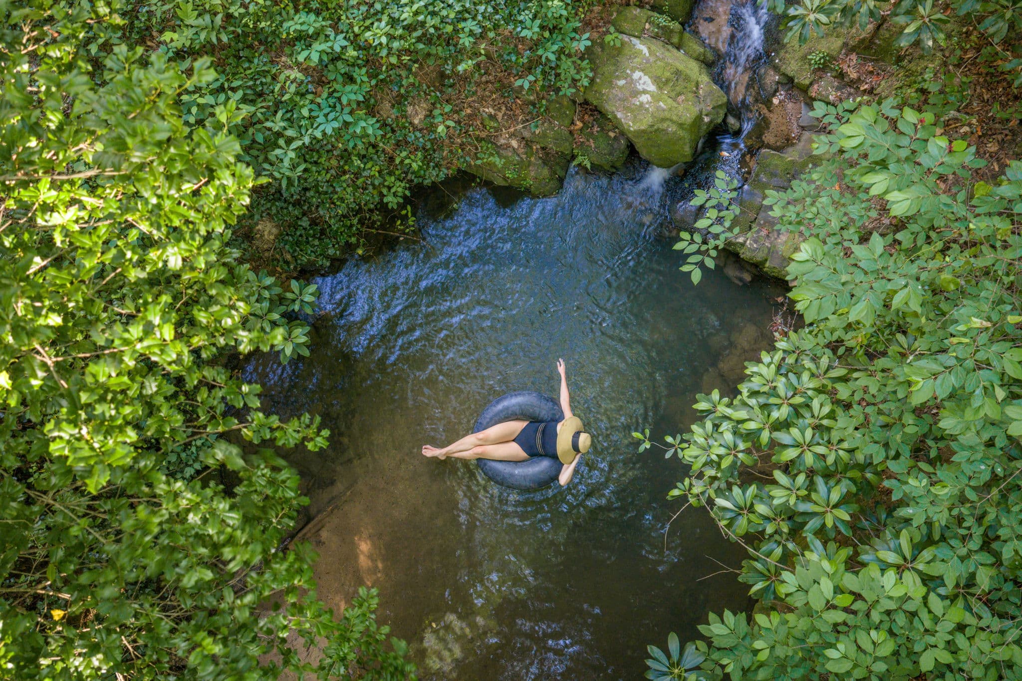 Natural swimming hole at Falling Water vacation rental — aerial view Dahlonega Georgia